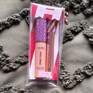 Tarte Shape Tape Concealer and Maracuja juicy lip plump with the sparkly top.